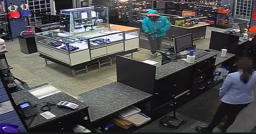 Edmonton police are hoping to identify a man and woman responsible for an armed robbery at a pawn shop in the area of 126 Avenue and Fort Road on Monday, Jan. 24, 2022.