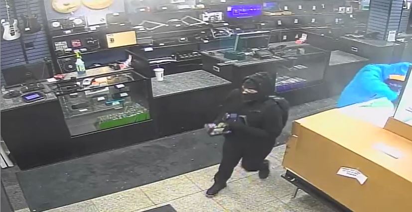 Edmonton police are hoping to identify a man and woman responsible for an armed robbery at a pawn shop in the area of 126 Avenue and Fort Road on Monday, Jan. 24, 2022.