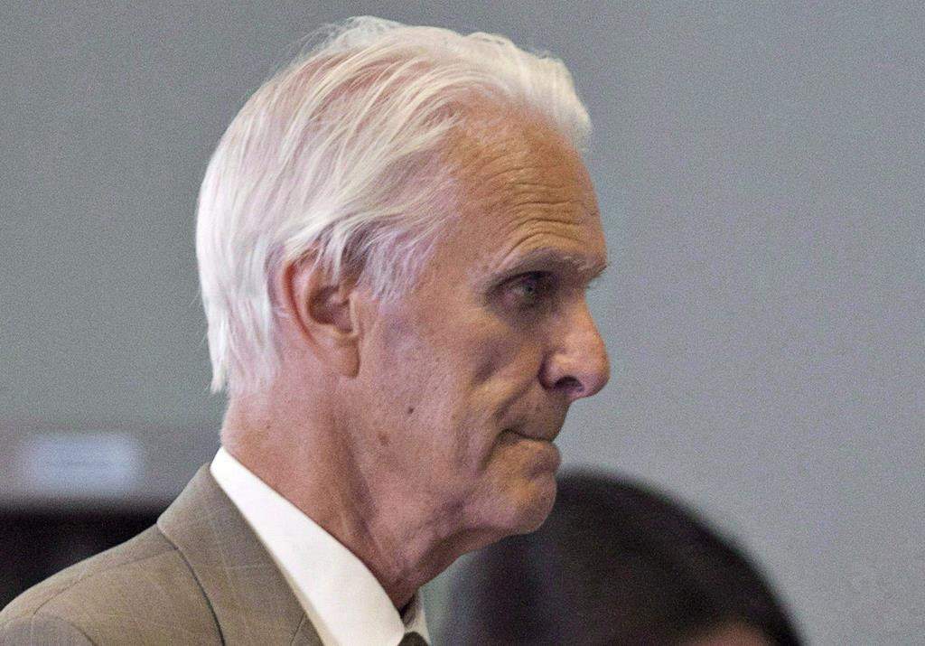 Former Quebec judge Jacques Delisle walks to court in Quebec City on June 14, 2012. 