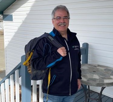 Bill Tonita with his lost backpack that was returned to him by a complete stranger.