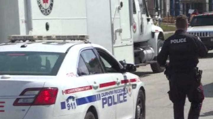 Police on scene following a shooting on Dean Avenue and Normandy Street on April 13, 2022.