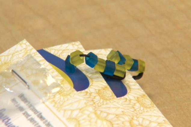 An image of homemade pins in Ukraine's national colours, made by Edmonton Grade 3 students.