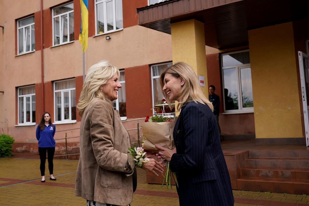 First lady Jill Biden greets Olena Zelenskyy, spouse of Ukrainian’s President Volodymyr Zelenskyy, outside of School 6, a public school that has taken in displaced students in Uzhhorod, Ukraine, Sunday, May 8, 2022.