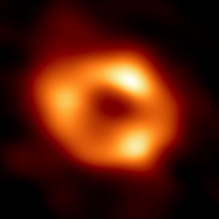 This image released by the Event Horizon Telescope Collaboration, Thursday, May 12, 2022, shows a black hole at the center of our Milky Way galaxy. The Milky Way black hole is called Sagittarius A*, near the border of Sagittarius and Scorpius constellations. It is 4 million times more massive than our sun.