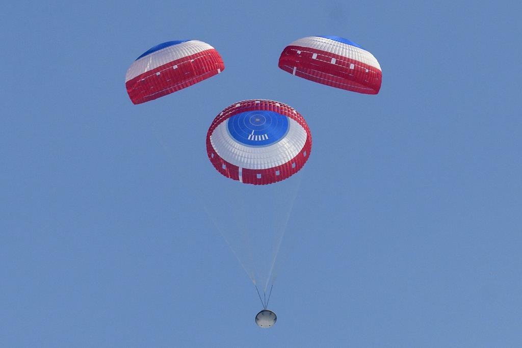 Boeing's CST-100 Starliner spacecraft lands at White Sands Missile Range's Space Harbor, Wednesday, May 25, 2022, in New Mexico.