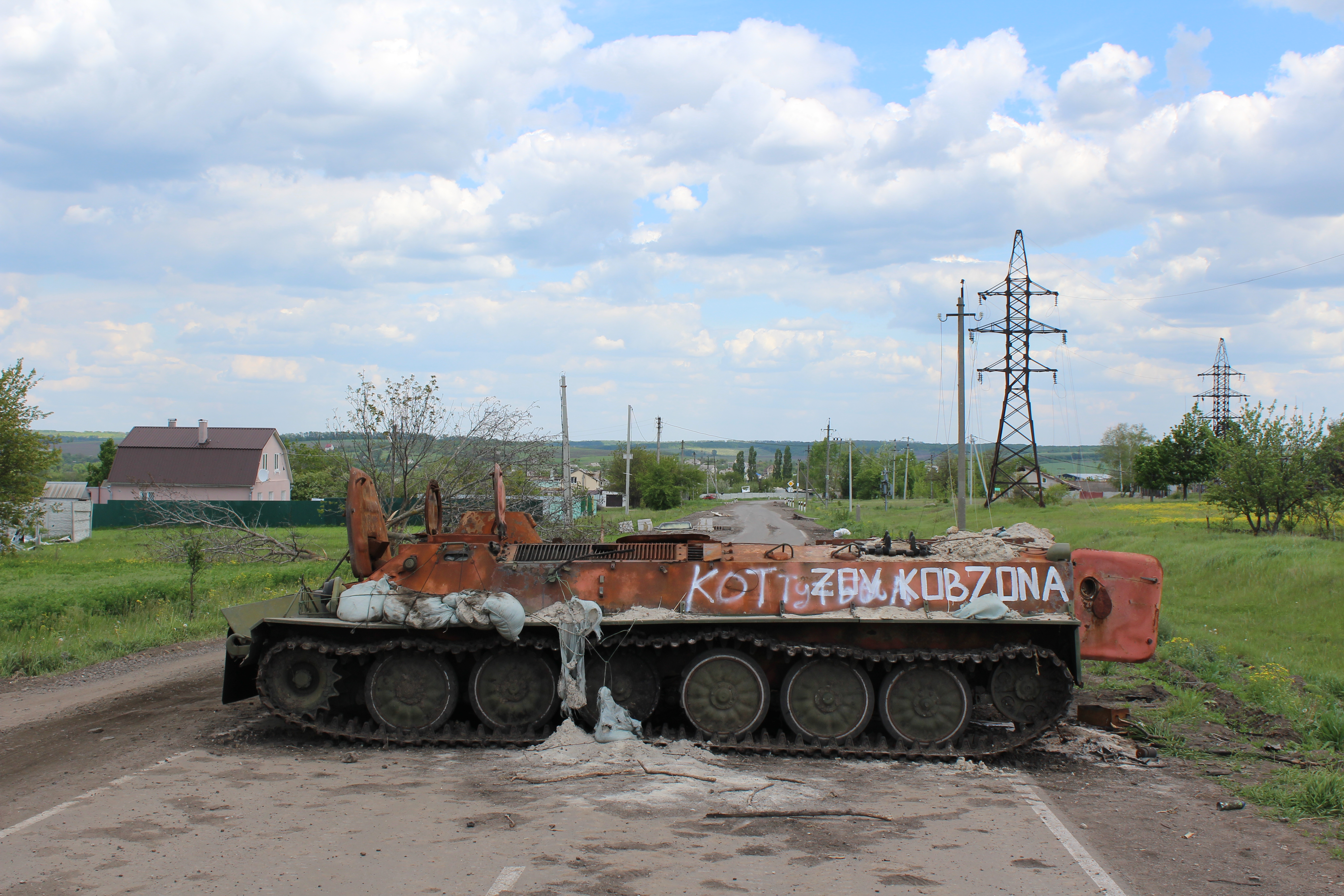 Destroyed Russian vehicle blocks entrance to Vilkhivka, Ukraine, on May 19, 2022, near location where Rita Horbyk suffered a fatal head wound.