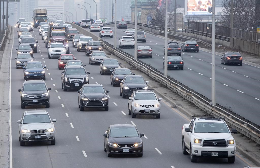 Heavy traffic leaves the downtown core in Toronto on Thursday Jan. 14, 2021.