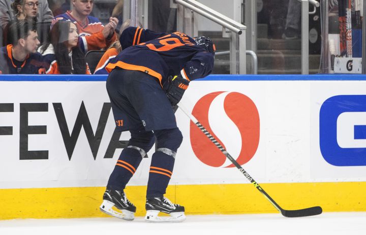 Edmonton Oilers’ Leon Draisaitl (29) is injured during second period NHL conference finals action against the Colorado Avalanche, in Edmonton on Monday, June 6, 2022.