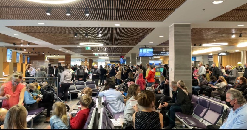 Line ups at Kelowna International Airport are long these days. 