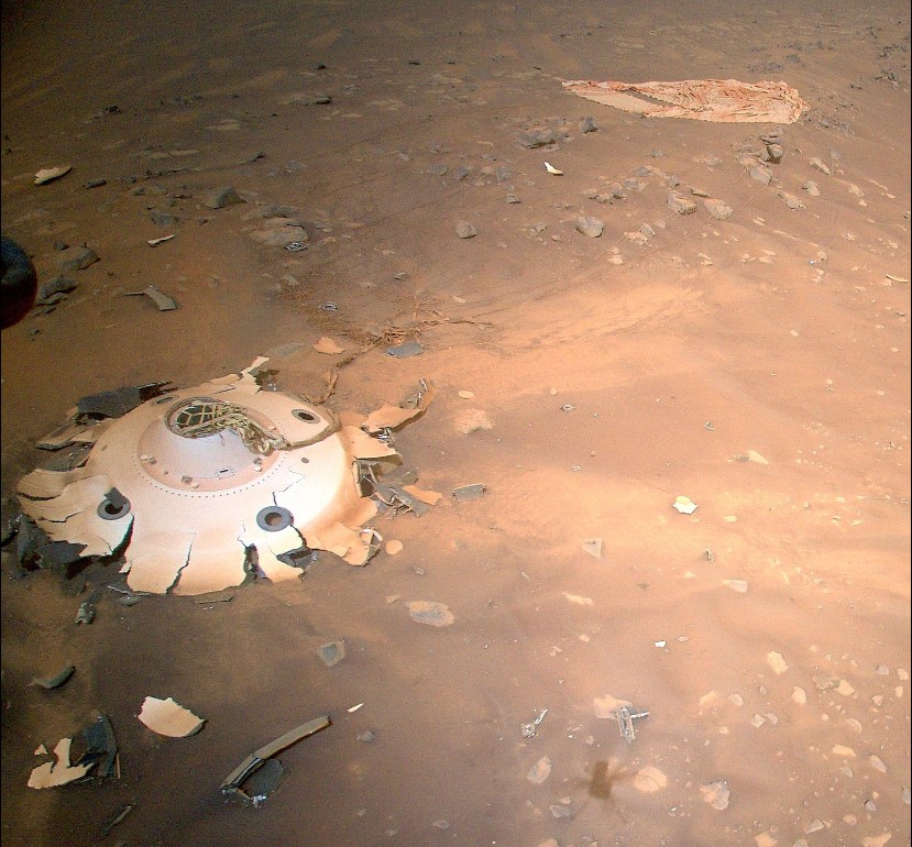 The parachute and cone-shaped backshell of the Perseverance rover, captured by NASA’s Ingenuity helicopter, on April 19, 2022.