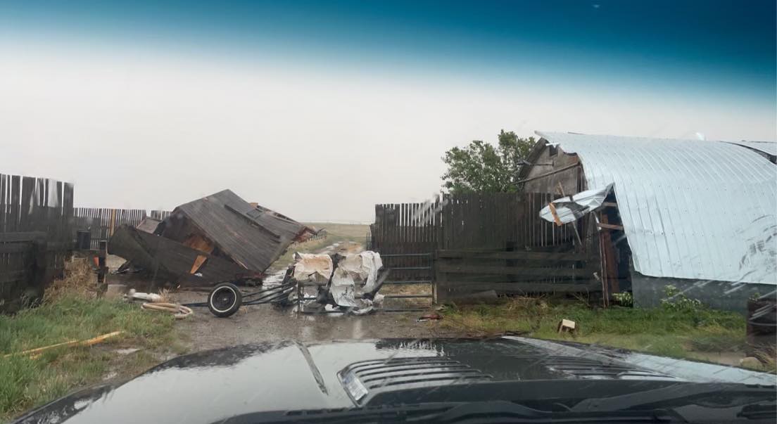 Damage on a farm near Enchant, Alta., is shown following what is suspected to be a funnel cloud on June 6, 2022.