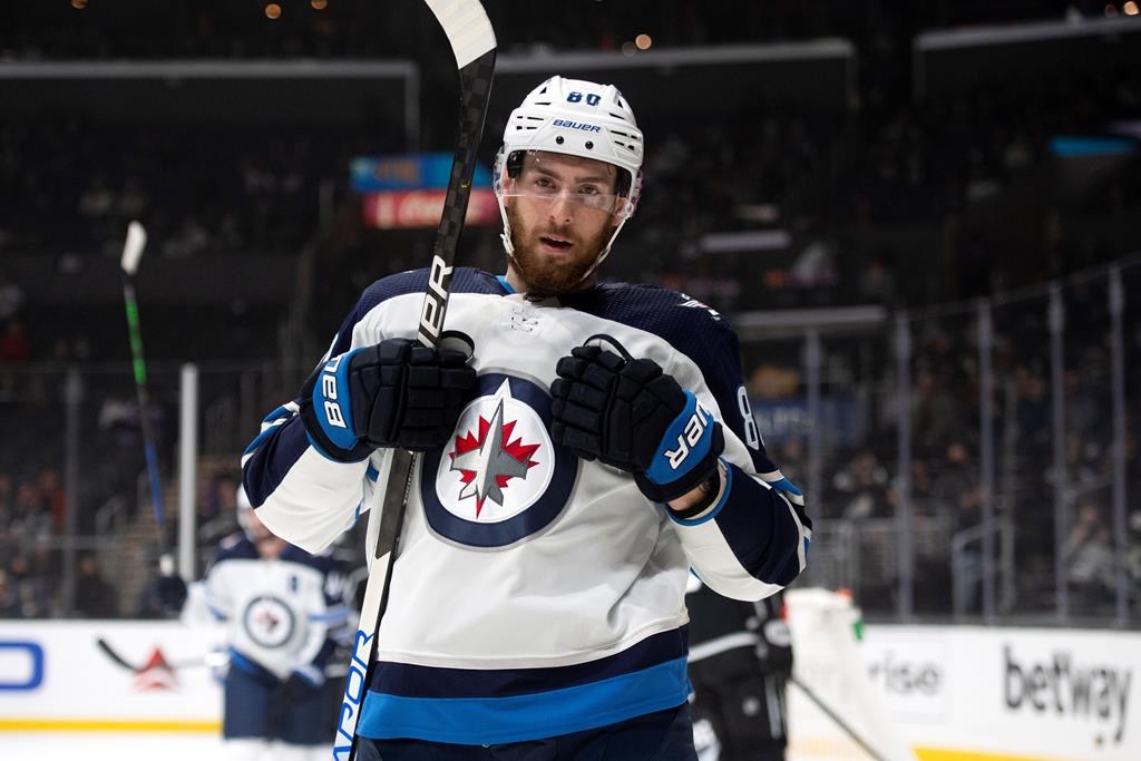 Winnipeg Jets center Pierre-Luc Dubois reacts after scoring a goal in the first period of the team’s NHL hockey game against the Los Angeles Kings on Thursday, Oct. 28, 2021 in Los Angeles.