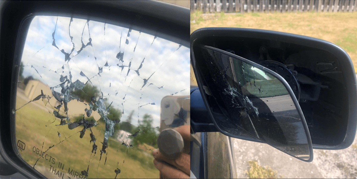 Smashed car mirrors outside the Indigo Lounge and Wellness Centre on June 27, 2022