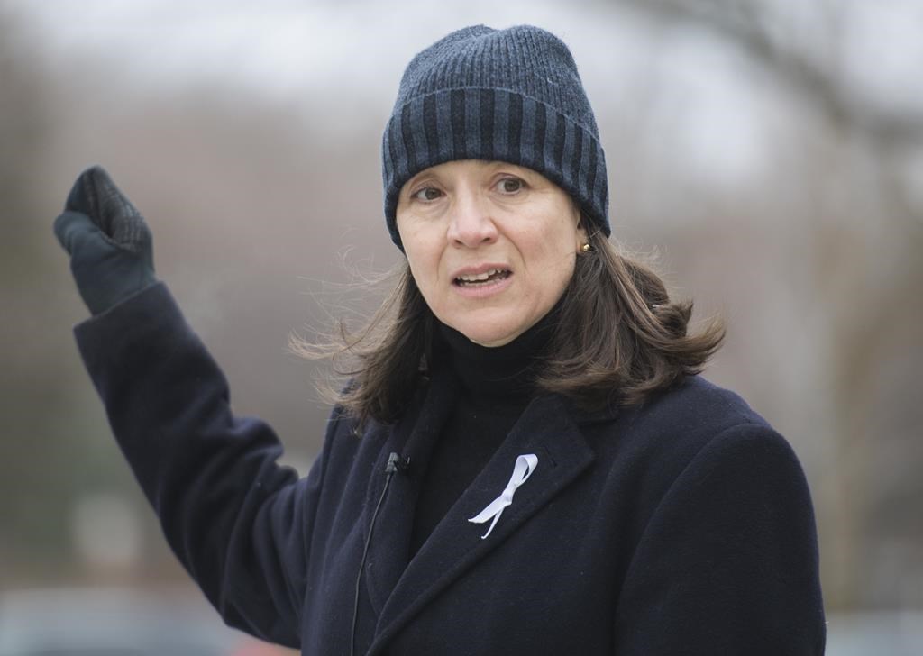 Nathalie Provost, a survivor of the École Polytechnique shooting in 1989 speaks during an event in Montreal, Sunday, Dec. 6, 2020.  