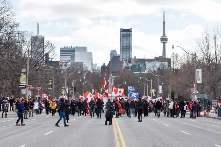 Anti-mandate protesters, also known as Freedom Convoy, took to the street in downtown Toronto to protest vaccine mandates in Toronto, Ontario, February 12, 2022. 