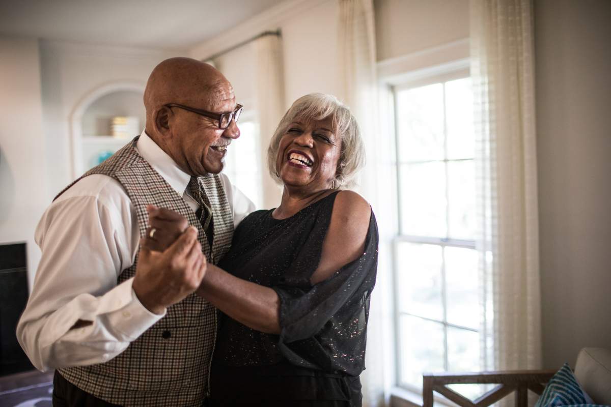 Two seniors dancing.