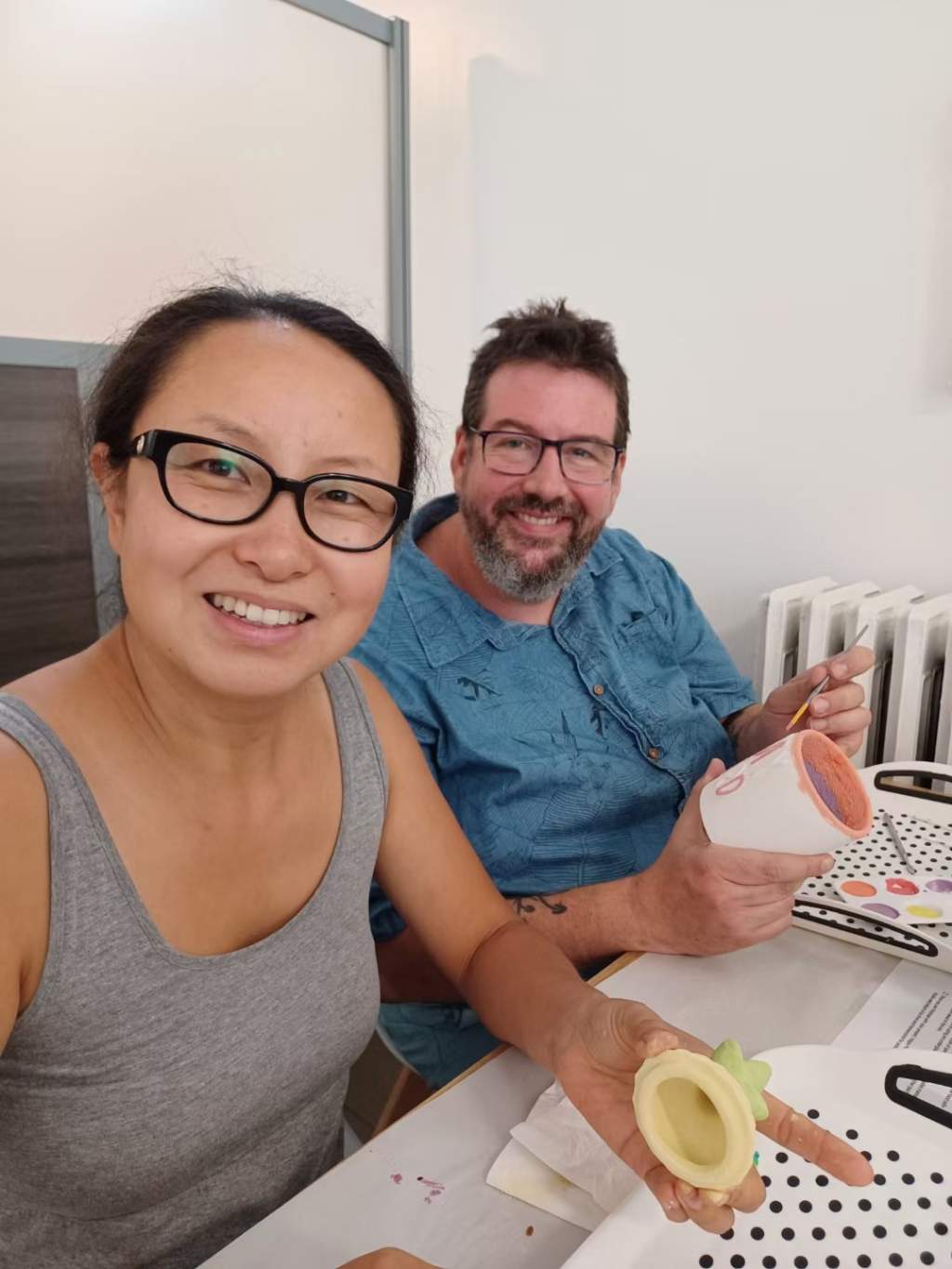 Simon McNeil and his wife, Pam Han