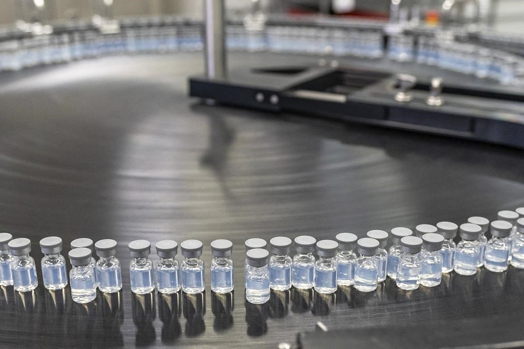 August 2022 photo provided by Pfizer shows vials of the company's updated COVID-19 vaccine.