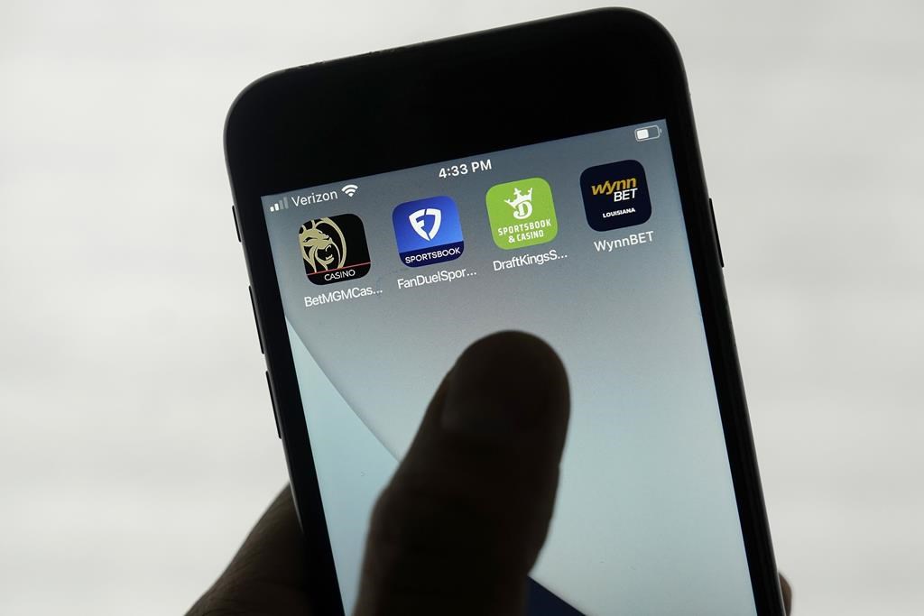 FanDuel, DraftKings and other online gambling apps are displayed on a phone in San Francisco, Monday, Sept. 26, 2022. 