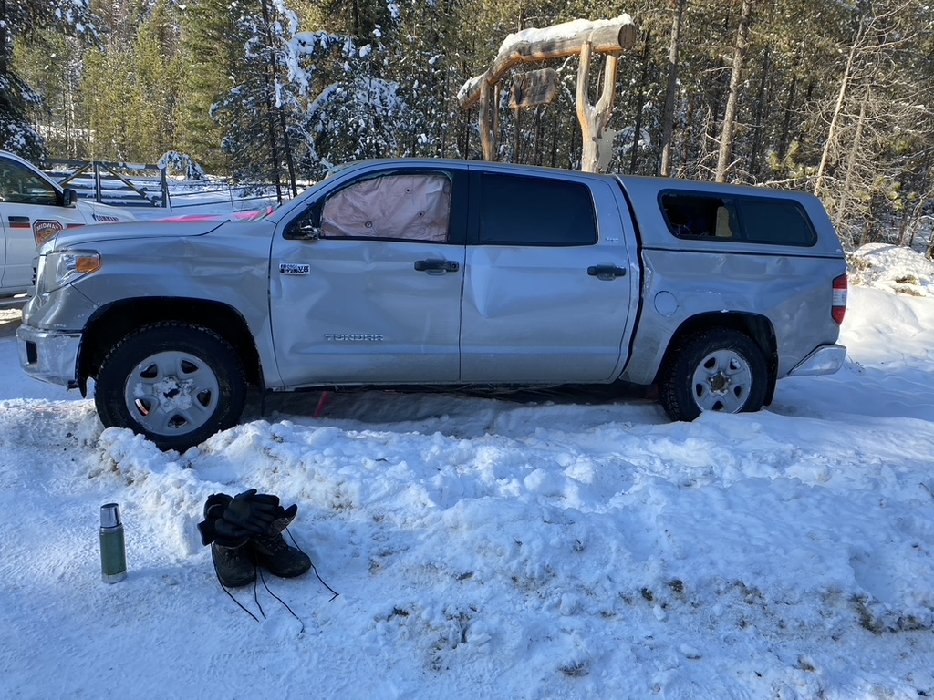 Another photo showing the damaged truck after it had been flipped onto its wheels.