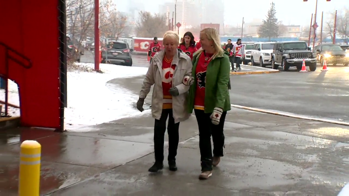 Calgary Flames fan Jess Taylor and British grandma Pamela Dawber attend the Calgary Flames game on Nov. 1, 2022.
