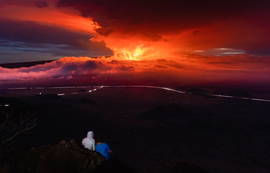 The Big Island's Mauna Loa Volcano erupts on November 28, 2022 on the Island of Hawaii.
