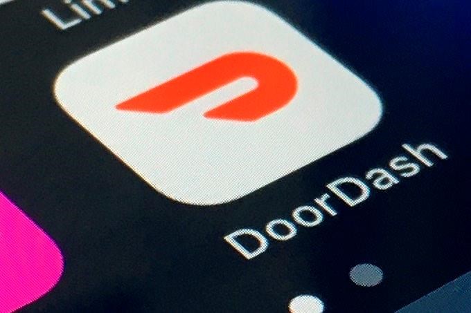 In this Feb. 27, 2020, file photo, the DoorDash app is shown on a smartphone in New York. 
