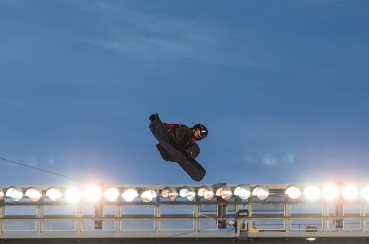 Cameron Spalding of Canada makes his jump in The Style Experience FIS Snowboard Big Air World Cup qualifiers in Edmonton on Friday, December 9, 2022.
