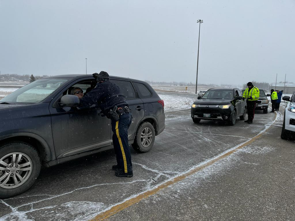 Officers conducting traffic stops. 