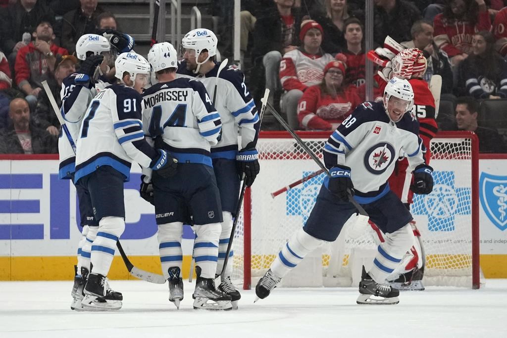 Winnipeg Jets defenseman Nate Schmidt (88) celebrates his goal against the Detroit Red Wing in the second period of an NHL hockey game Tuesday, Jan. 10, 2023, in Detroit.