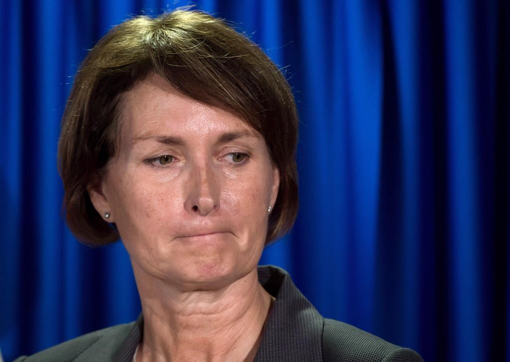 Former B.C. Representative for Children and Youth Mary Ellen Turpel-Lafond listens during a news conference after releasing a joint report with the B.C. Information and Privacy Commissioner about cyberbullying, in Vancouver, B.C., on Friday Nov. 13, 2015. Six out of 10 universities say they're reviewing honorary degrees conferred on \Turpel-Lafond, after being asked by a group of Indigenous women to revoke them following a CBC investigation into her claims of Indigenous heritage. THE CANADIAN PRESS/Darryl Dyck.