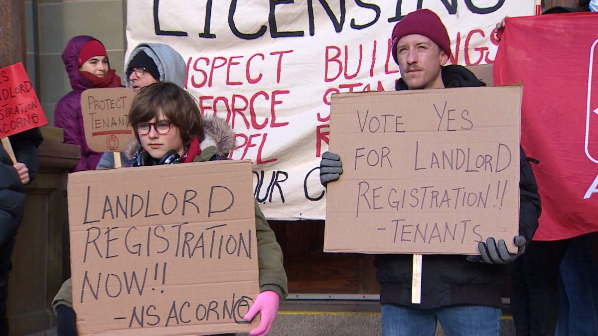 Members of ACORN rally outside Halifax City Hall on Jan. 24, before a bylaw to register rental properties passed first reading.