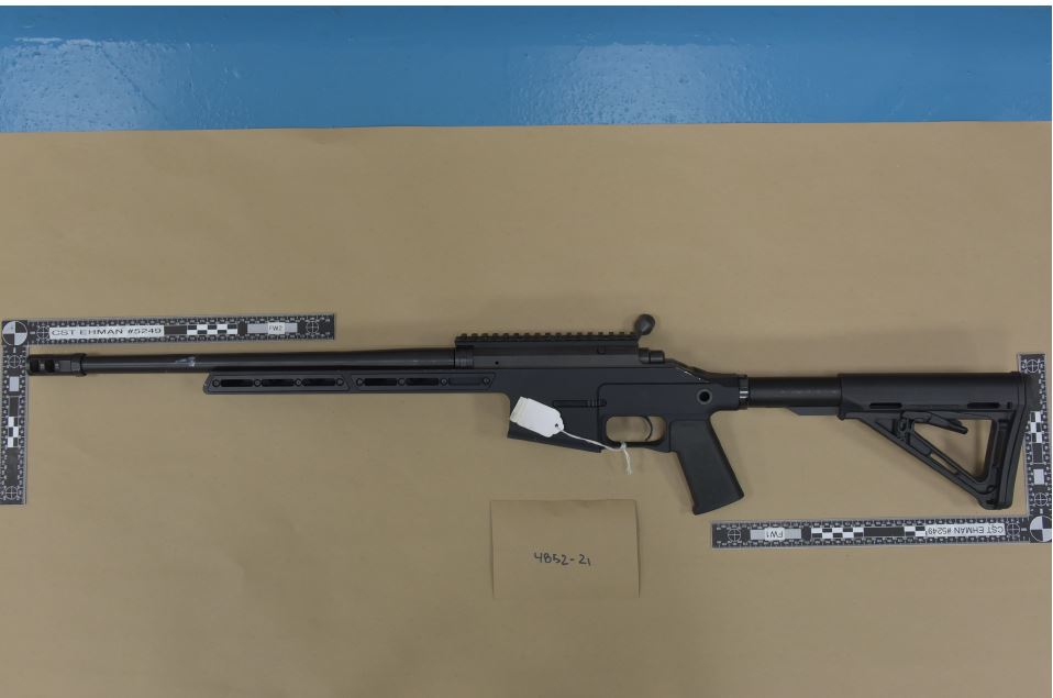 An assault rifle found by Calgary police as part of a monthlong investigation into drug trafficking and vehicle cloning.