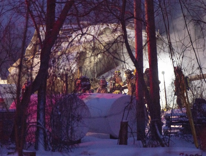 Firefighters work the scene after an explosion at a propane company, Thursday, January 12, 2023 in Saint-Roch-de-L’Achigan, Que. Ryan Remiorz/The Canadian Press
