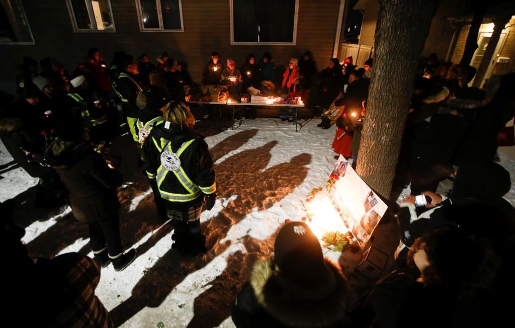 Family and friends of three murdered women gather at a vigil in Winnipeg, Thursday, December 1, 2022. It was announced that Jeremy Skibicki faces three more charges of first-degree murder. In addition to Rebecca Contois, who was identified earlier, Skibicki has been charged in the deaths of Morgan Beatrice Harris, Marcedes Myran, and an unidentified woman whom Indigenous leaders have dubbed Buffalo Woman. THE CANADIAN PRESS/John Woods.