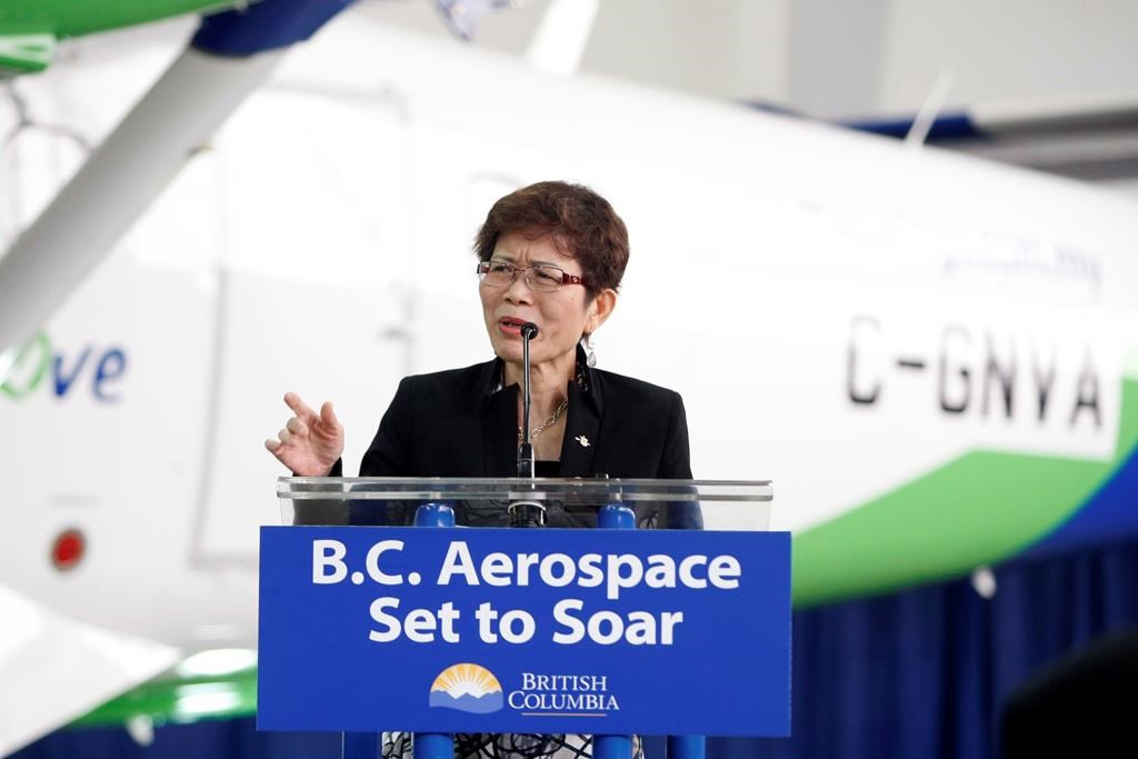 Former minister of international trade Teresa Wat speaks during a press conference in Sidney, B.C., on April 8, 2014. BC Liberal leader Kevin Falcon says he supports supervised drug injection sites, but when Wat spoke to the audience of a Mandarin news show last week, she had a different message. THE CANADIAN PRESS/Chad Hipolito.