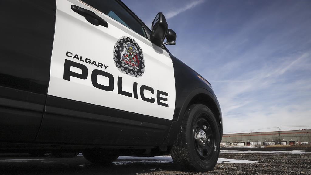 Police vehicles at Calgary Police Service headquarters in Calgary on Thursday, April 9, 2020. 