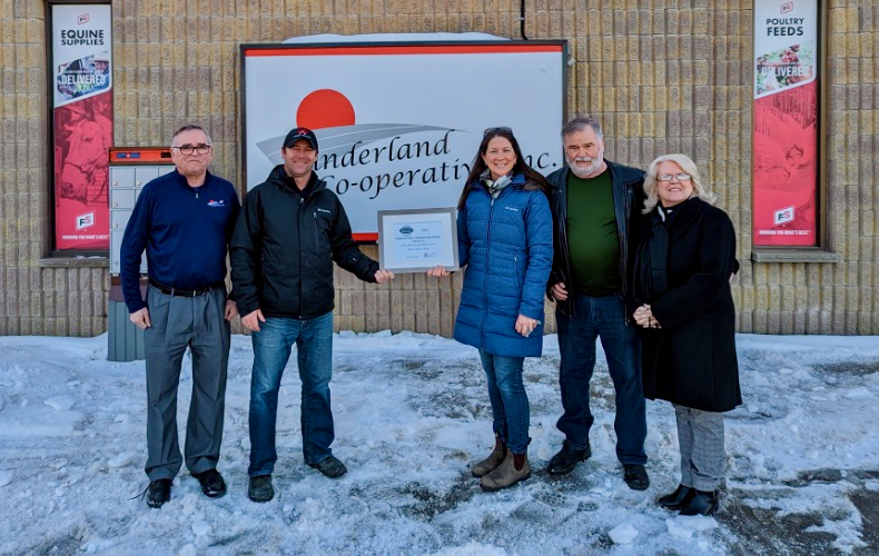 Indian River Acres farm owners Kevin Cornish, second from left and Janet Dawson, receive the Peterborough Agricultural Innovation Award from Garth Stoner, far left of Sunderland Co-op, and Elmer Buchanan from the Peterborough Agricultural Roundtable, and Peterborough County Warden Bonnie Clark.