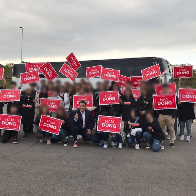 Han Dong, Liberal Party Don Valley North candidate, poses with a group of students in 2019.