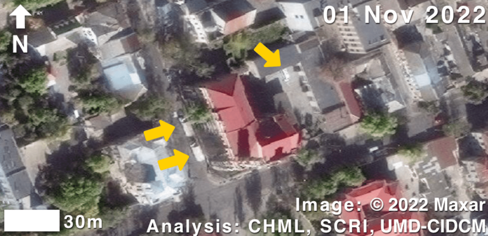 Satellite image of Russian trucks involved in looting of Kherson art museum.