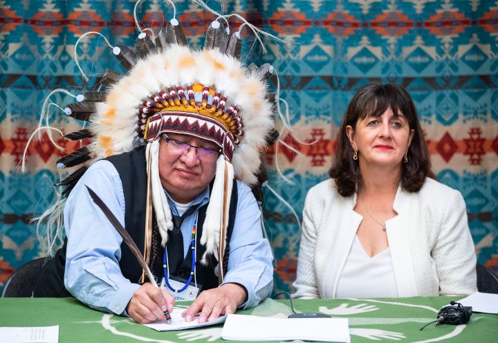 Chief Desmond Bull and Assistant Deputy Minister for Indigenous Services Canada Catherine Lapp, sign a bilateral agreement between Louis Bull Tribe and the Government of Canada to support Bill C-92, in Maskwacis, south of Edmonton on Wednesday February 1, 2023. This historic agreement will enable the Nation to administer jurisdiction over their own child and family services.
