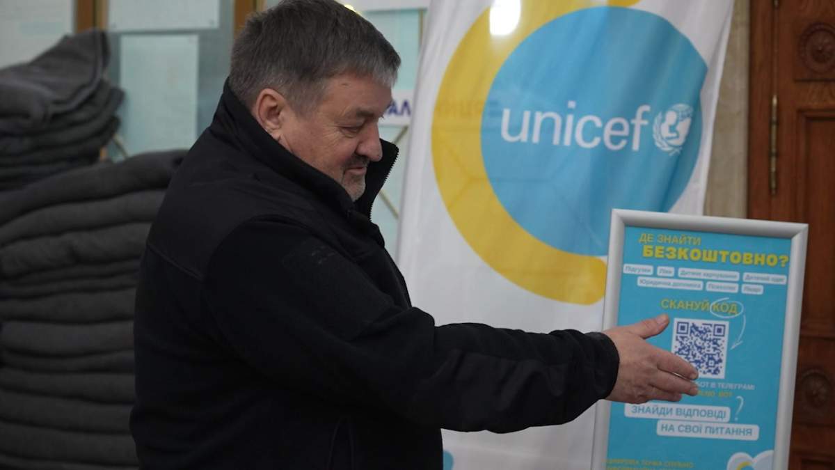 Kyiv station manager Leonid Loboyko points out supplies donated by Unicef for the comfort of evacuees.
