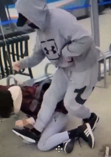 A person being assaulted at a west end Kingston Transit transfer station