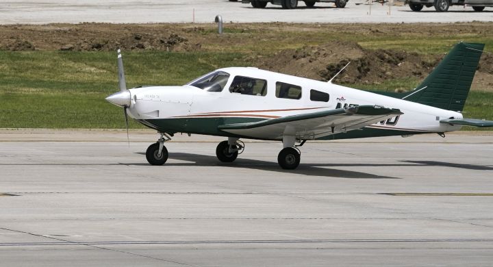 A small plane taxis past construction. (File photo)