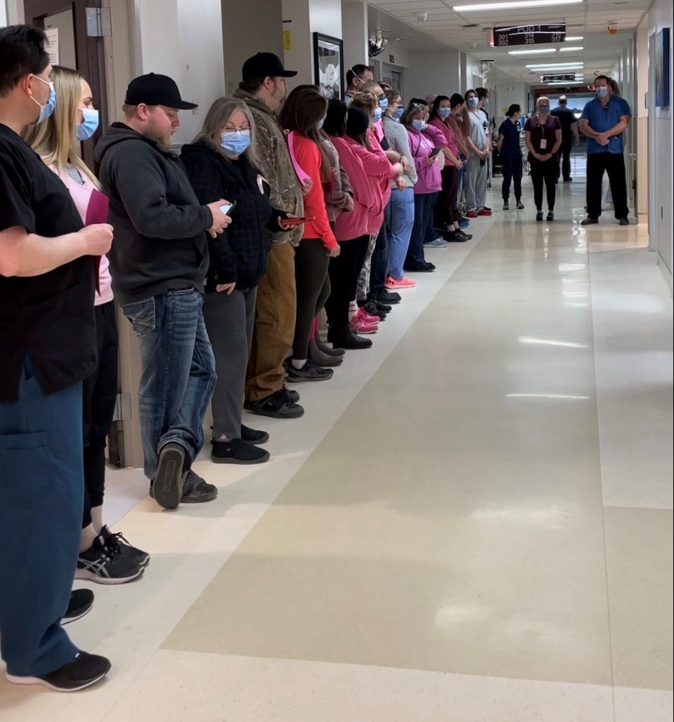 Hospital staffers line up for the ‘hero’s walk’ prior to Trevor Pierce’s body undergoing organ donation.