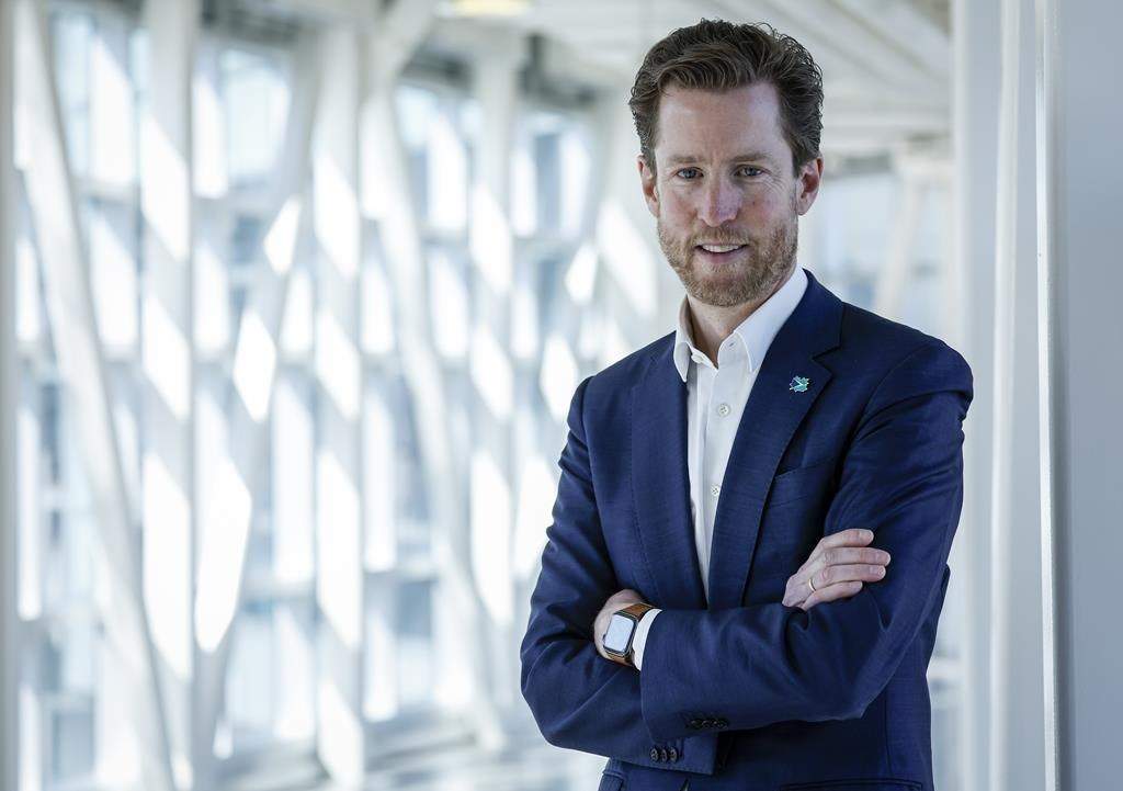 WestJet CEO Alexis von Hoensbroech pauses for a portrait at the airline's headquarters in Calgary, Alta., Thursday, June 30, 2022. The CEO of WestJet Airlines says his company is asking the federal government to allow airlines to recover passenger compensation costs from other industry partners, if they played a role in causing flight delays or disruptions.
