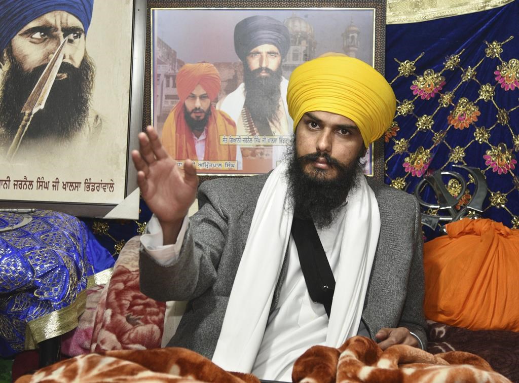 Sikh separatist leader and head of Waris Punjab De, or Punjab's Heirs, Amritpal Singh, talks to his supporters in the village Jallupur Khera, near Amritsar, India, Saturday, Jan.7, 2023. Indian police on Sunday April 23, arrested a Sikh separatist leader who has revived calls for secession of India's northern Punjab state bordering a hostile Pakistan, the police said.
