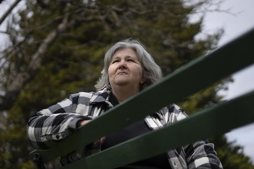 Sandra Page, who has a history of living unhoused throughout her life, poses in Halifax on Monday, April 24, 2023. Page wonders how the Nova Scotia government expects her to remain healthy when her welfare cheque was left frozen by the last budget, despite more than a year of high inflation.