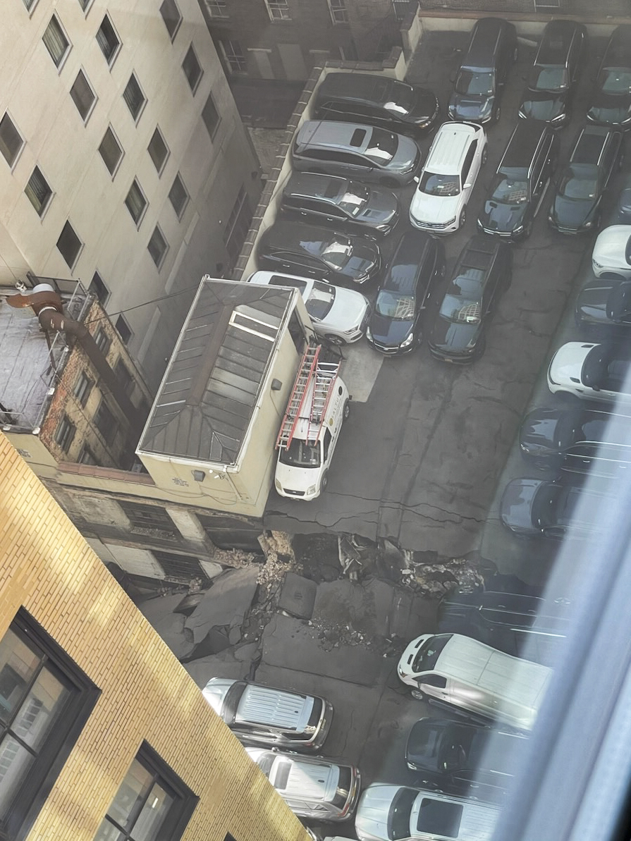 This photo provided by Charlie Franklin shows a partially collapsed parking garage in lower Manhattan’s Financial District on Tuesday, April 18, 2023, in New York City. Officials didn’t immediately release any information on injuries. (Charlie Franklin via AP)