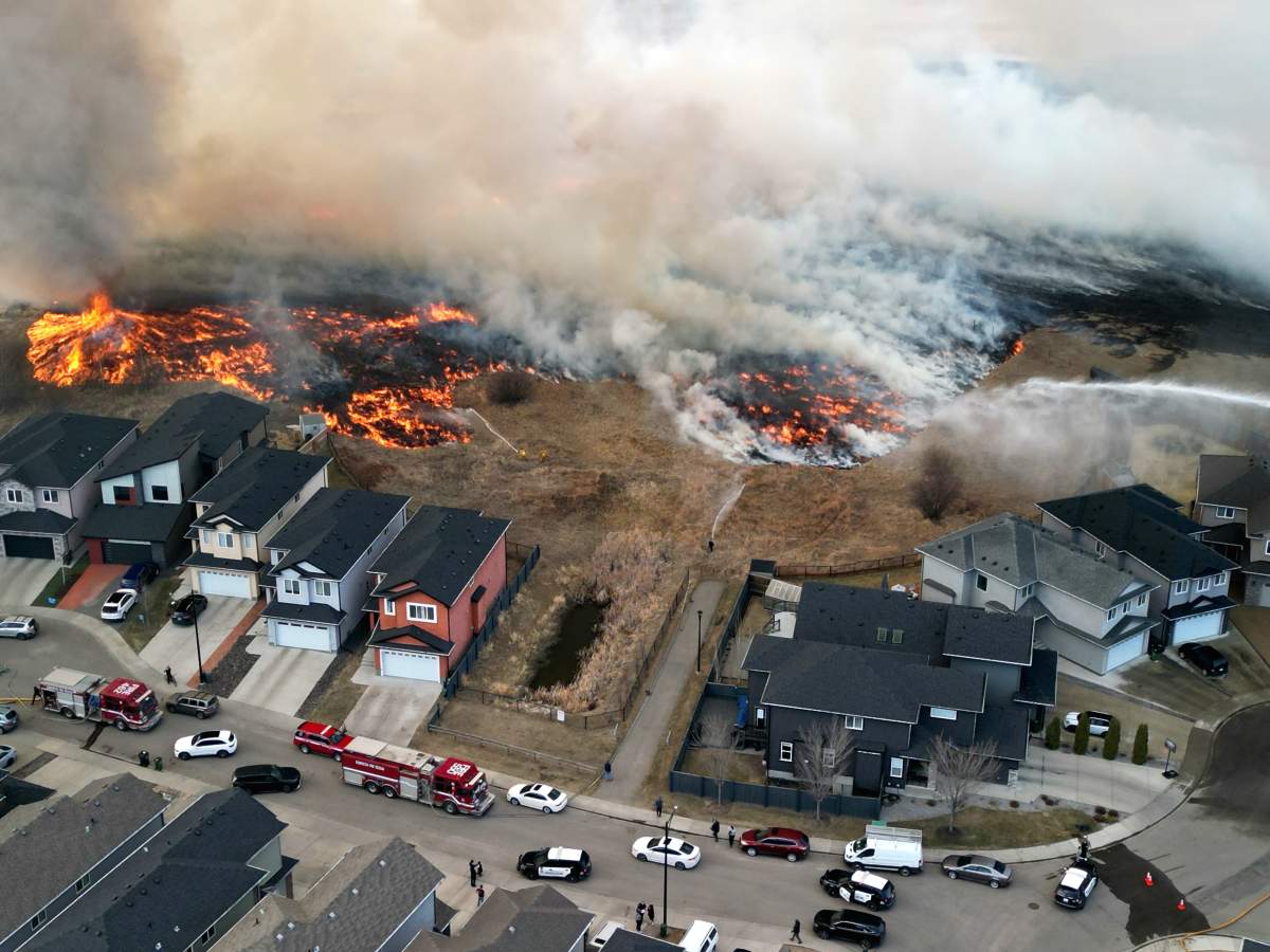 A grass fire near Edmonton's Albany neighbourhood, near Anthony Henday Drive and 127 Street, on Monday, April 24, 2023.
